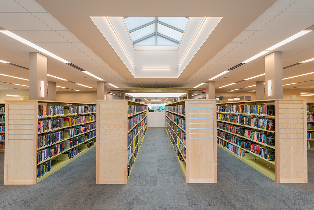 Henrietta Public Library — books under Solera skylight
